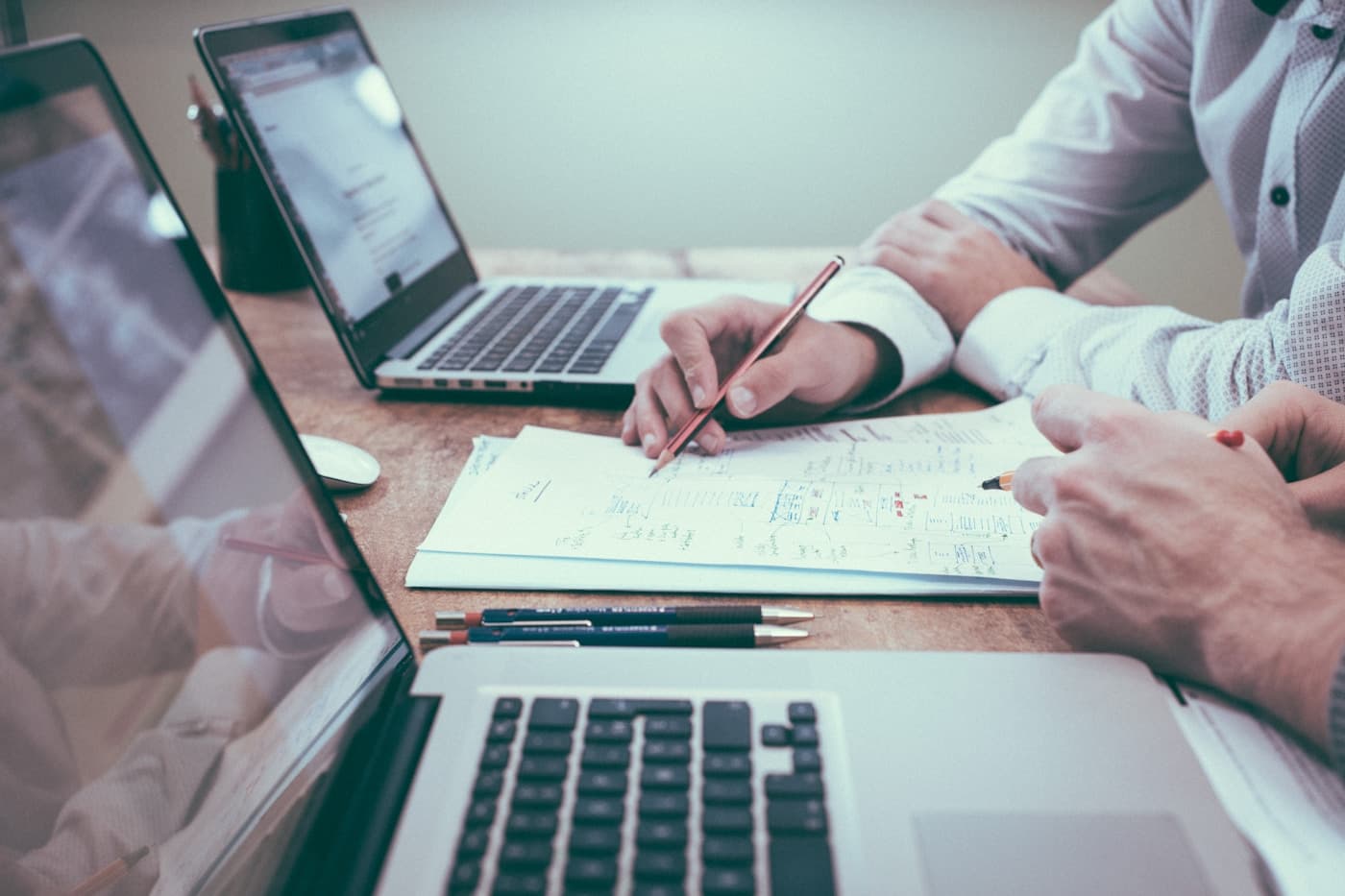 IT professional completing a structured offboarding workflow with organized documentation